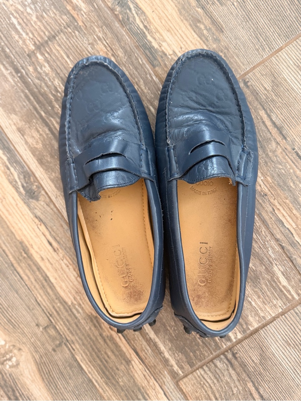 Gucci Navy Leather Penny Loafers with Embossed Logo